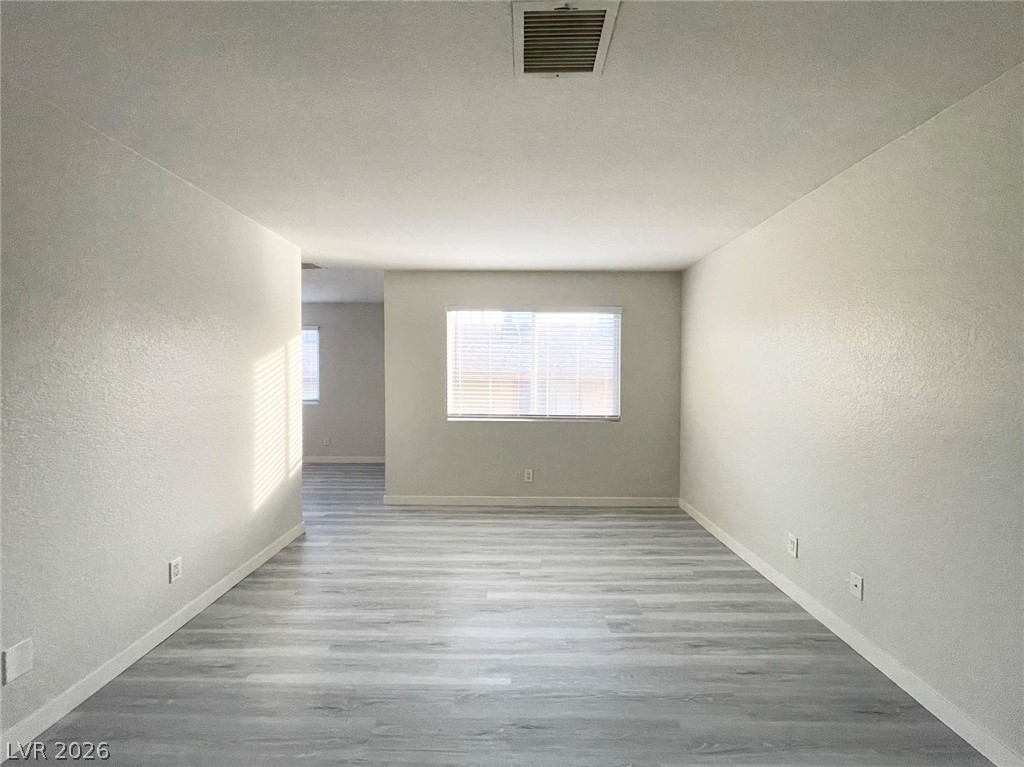 1834 North Decatur Boulevard, Unit 204 Las Vegas, NV 89108 - Photo 2 of 17 A well-lit interior offers contemporary flooring and ample natural illumination.