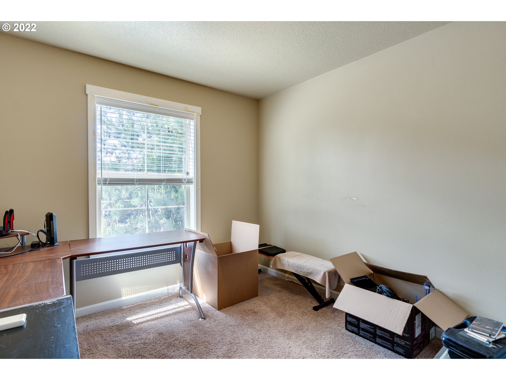 4310 North 4th Circle Ridgefield, WA 98642 - Photo 21 of 27 a living room with furniture and a window