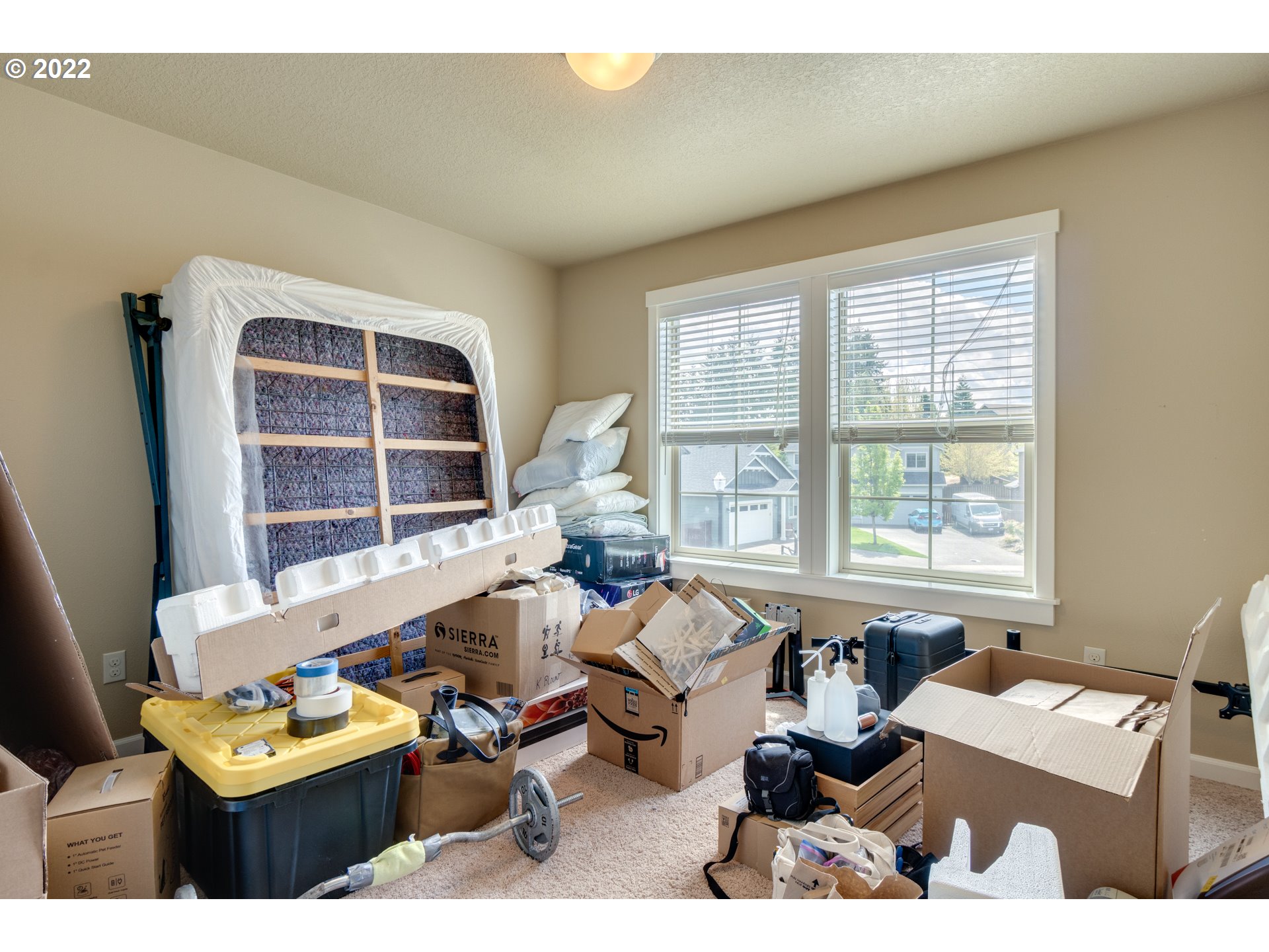 4310 North 4th Circle Ridgefield, WA 98642 - Photo 22 of 27 a living room with furniture and a large window