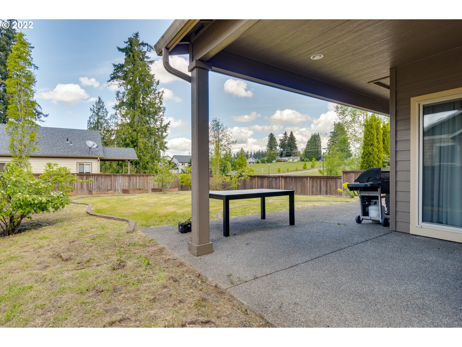 4310 North 4th Circle Ridgefield, WA 98642 - Photo 25 of 27 a swimming pool with outdoor seating