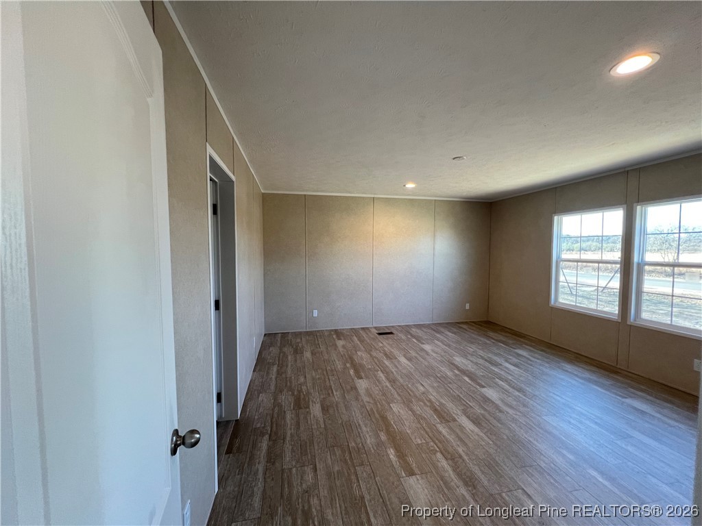 801 Horseshoe Road Autryville, NC 28318 - Photo 11 of 31 Primary bedroom- located off the living room
