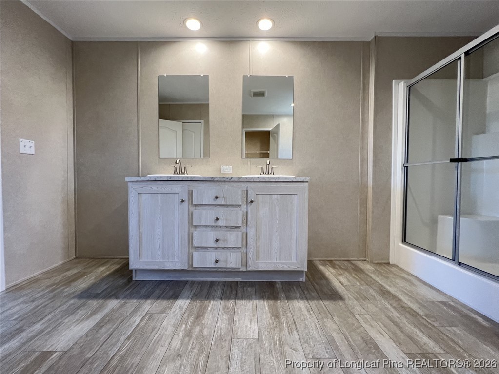 801 Horseshoe Road Autryville, NC 28318 - Photo 14 of 31 Primary bathroom view from closet