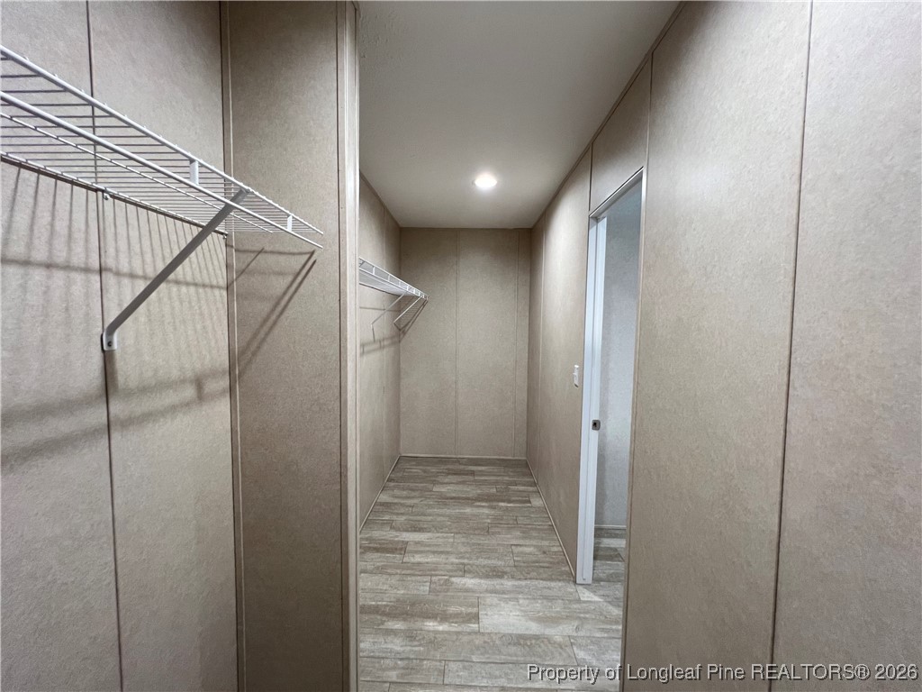 801 Horseshoe Road Autryville, NC 28318 - Photo 15 of 31 Primary bedroom closet off bathroom