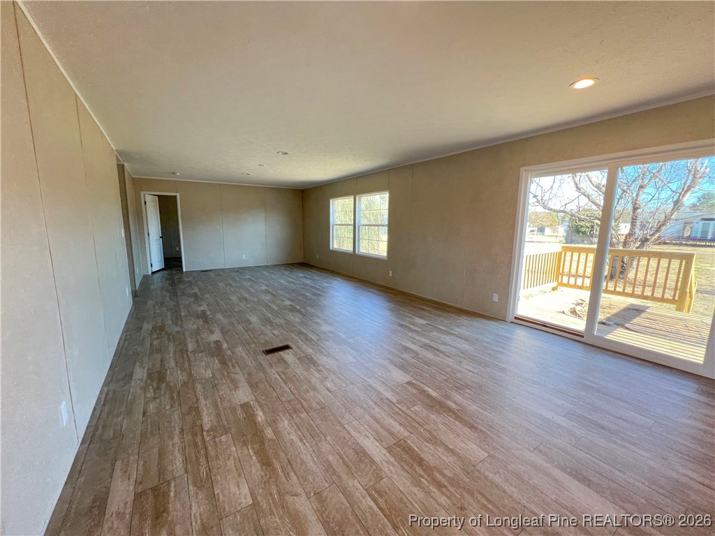 801 Horseshoe Road Autryville, NC 28318 - Photo 16 of 31 Open Dining Room & Den view from Kitchen