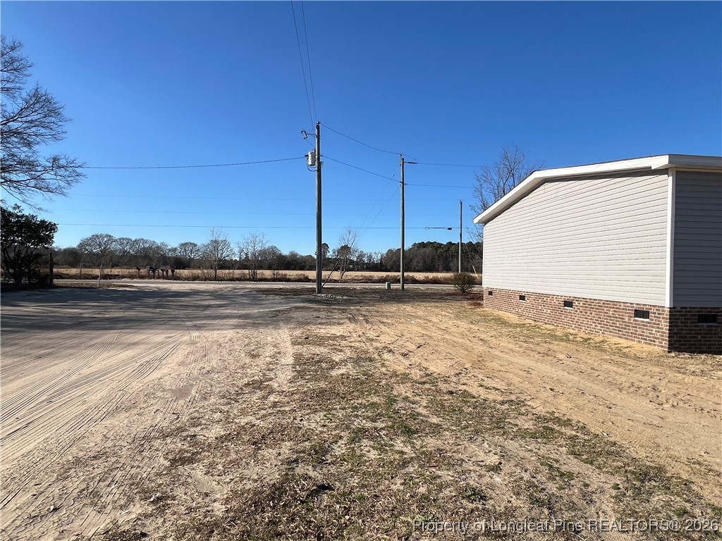 801 Horseshoe Road Autryville, NC 28318 - Photo 31 of 31 Side view