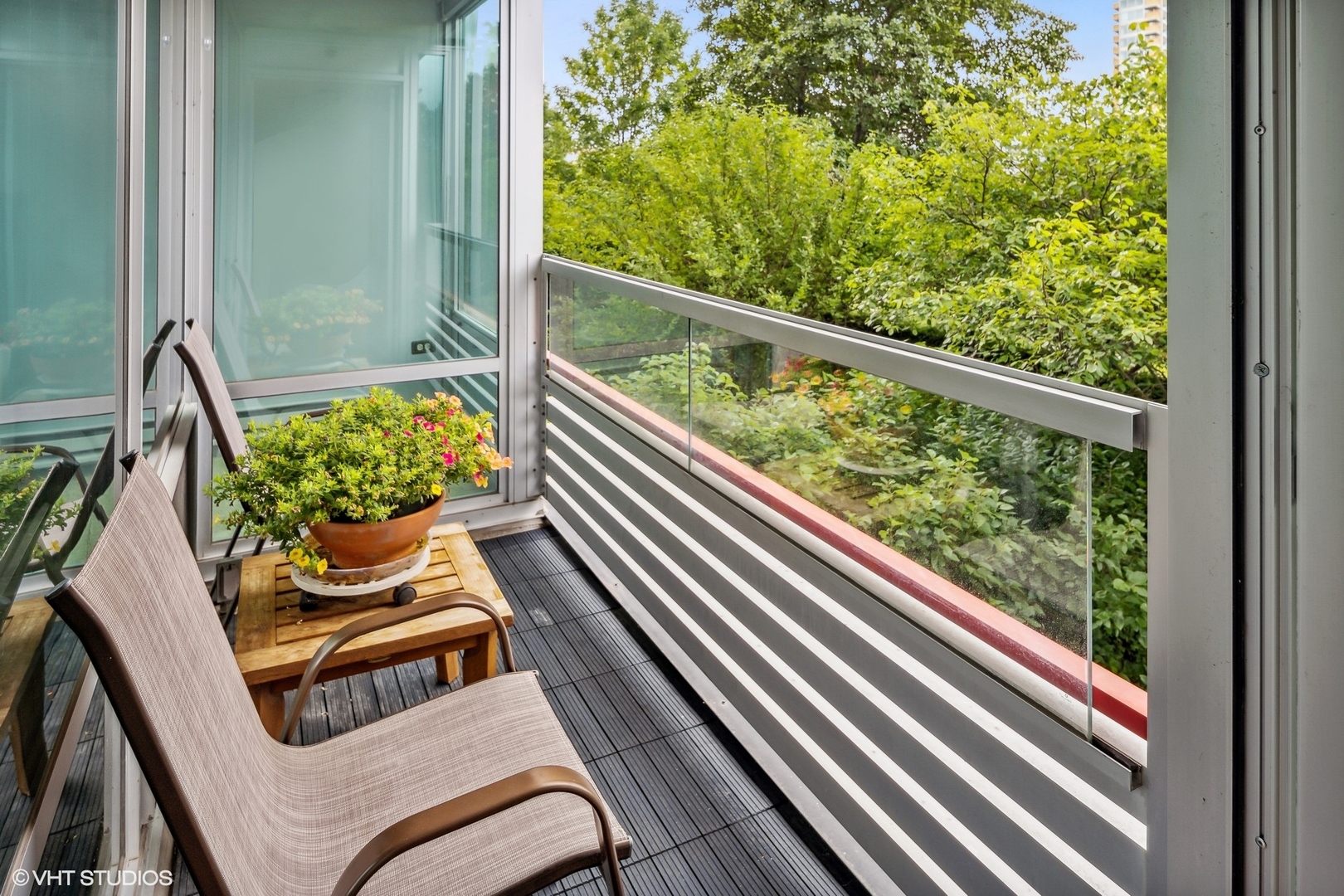 800 Elgin Road, Unit 614 Evanston, IL 60201 - Photo 7 of 17 a view of balcony with furniture