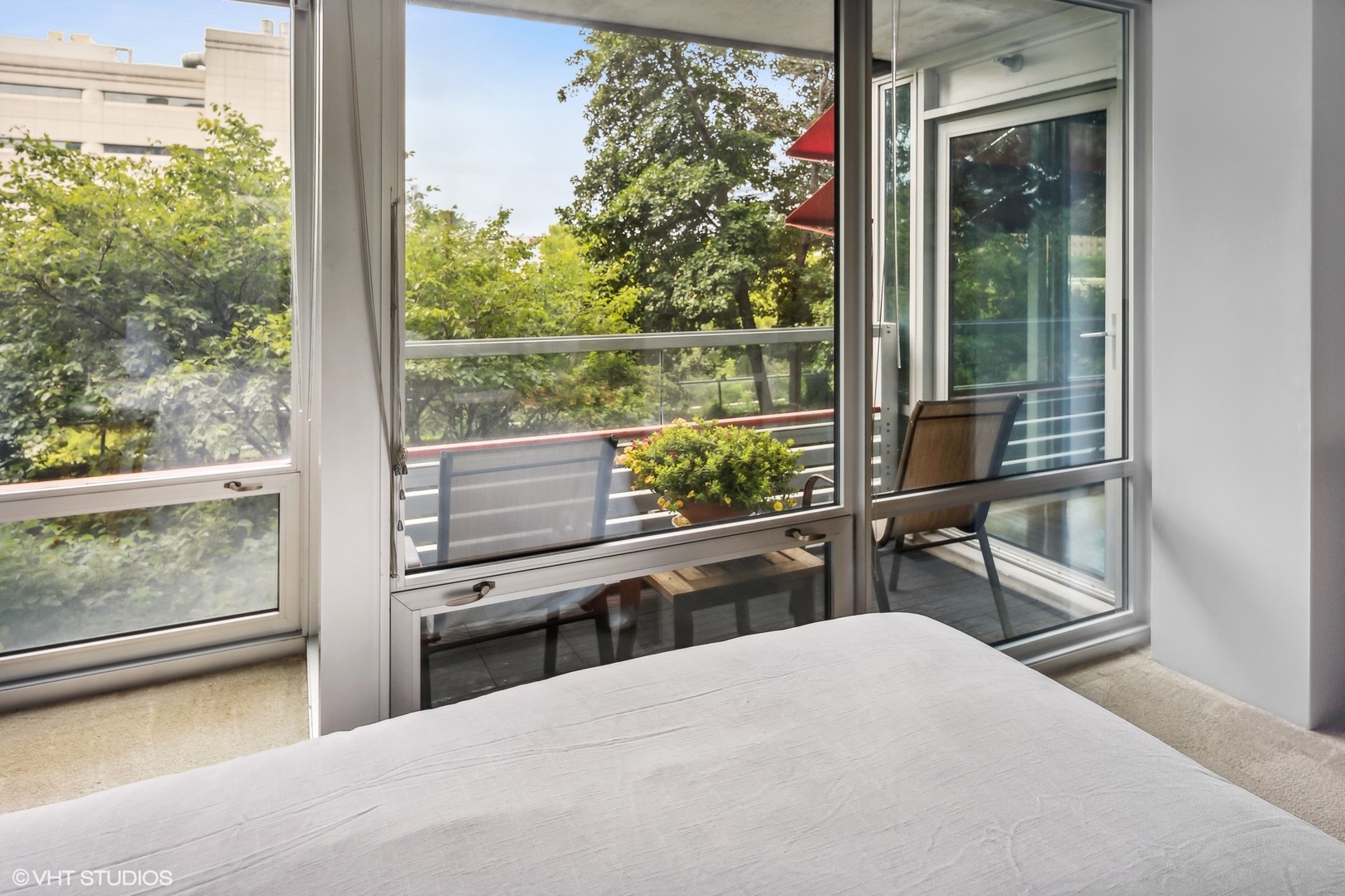 800 Elgin Road, Unit 614 Evanston, IL 60201 - Photo 9 of 17 a kitchen view with a large window and table