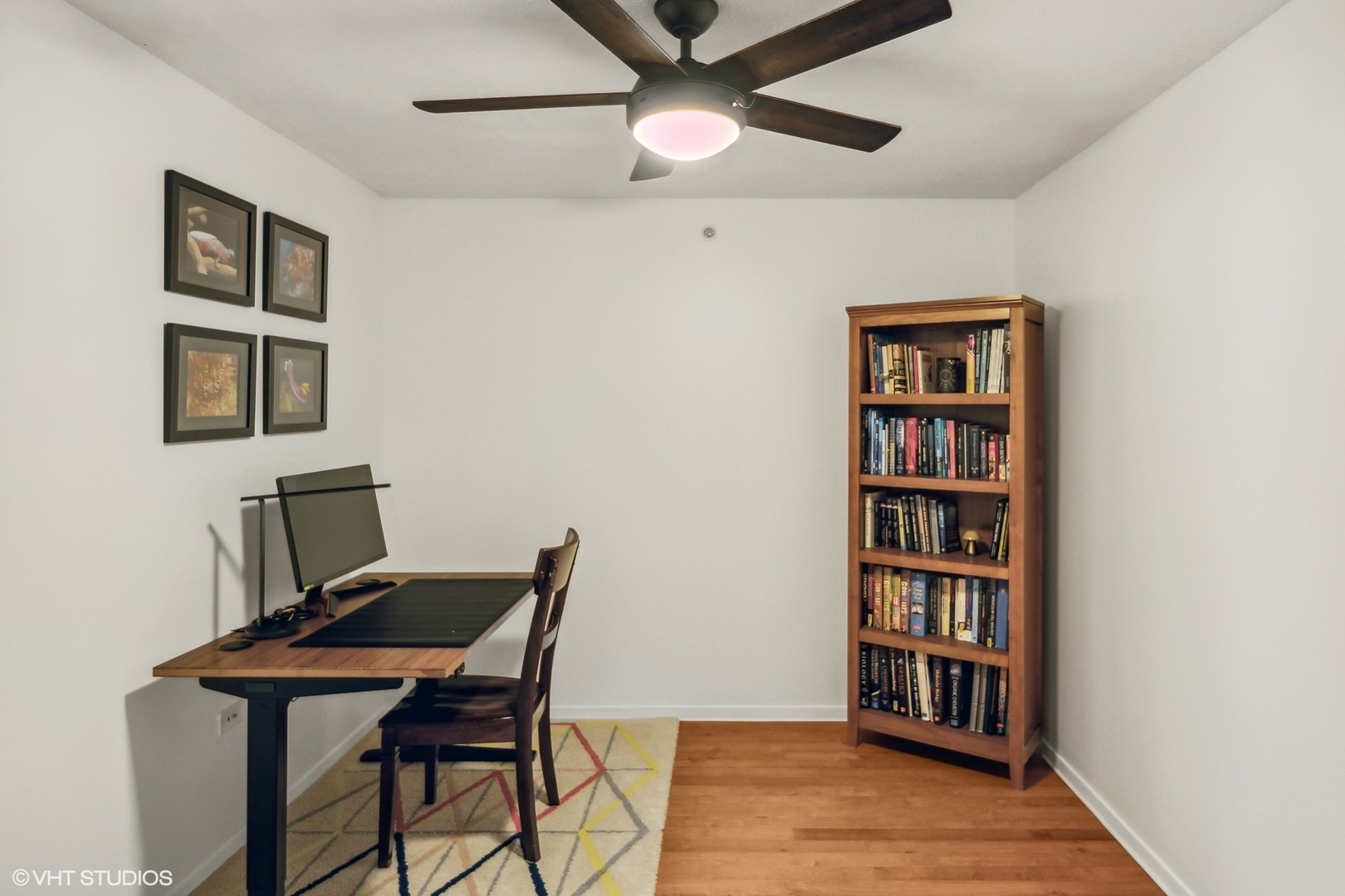 800 Elgin Road, Unit 614 Evanston, IL 60201 - Photo 10 of 17 a workspace with a bookshelf