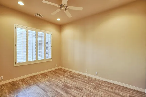 a view of a patio with a yard
