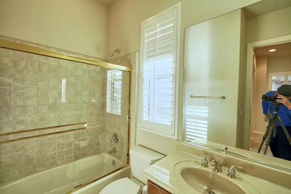 a view of a house with swimming pool and porch