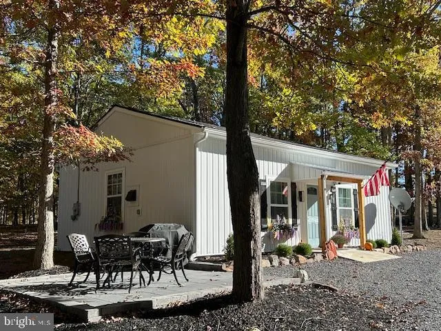 a front view of a house with patio