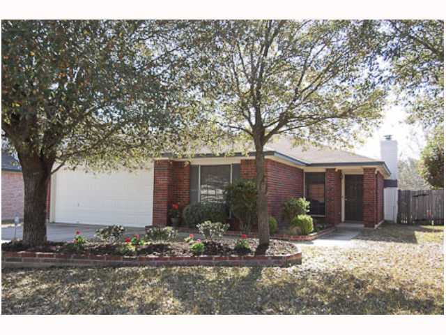 4720 Walsall Loop Austin, TX 78749 - Photo 1 of 1 a front view of house with yard and trees around