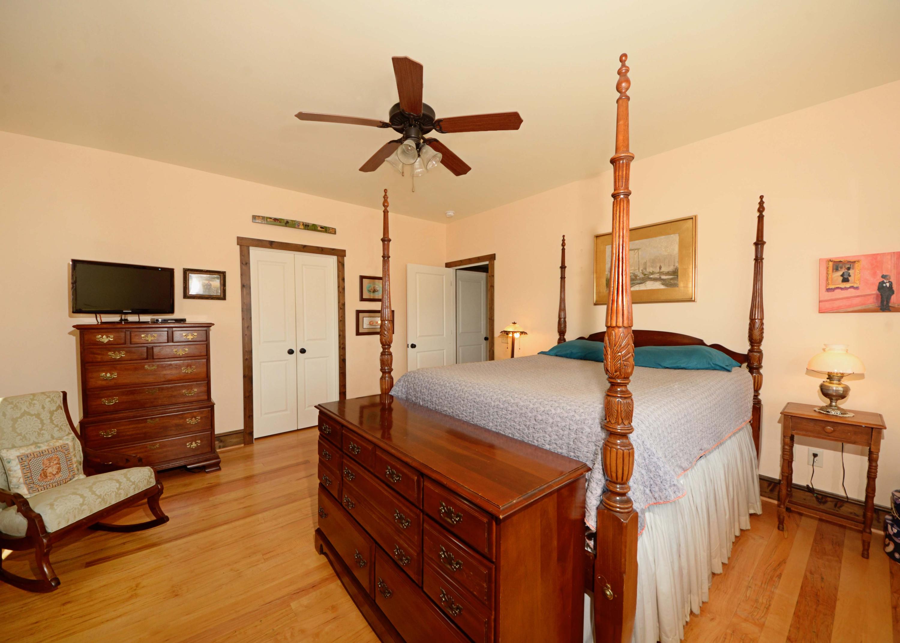 657 Poor Farm Road Southeast Floyd, VA 24091 - Photo 14 of 40 a bed room with a bed