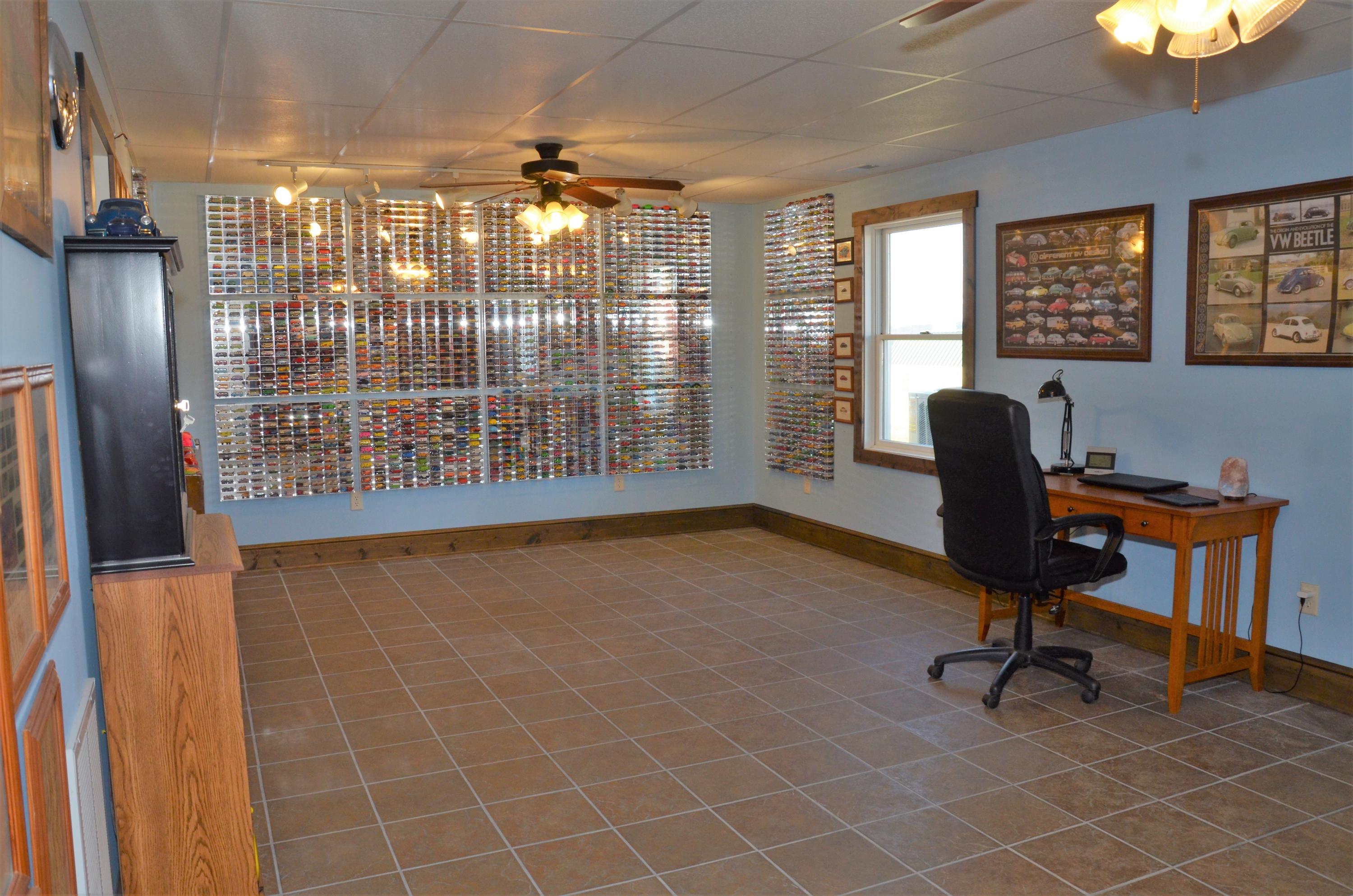 657 Poor Farm Road Southeast Floyd, VA 24091 - Photo 36 of 40 a view of a workspace with furniture and a window