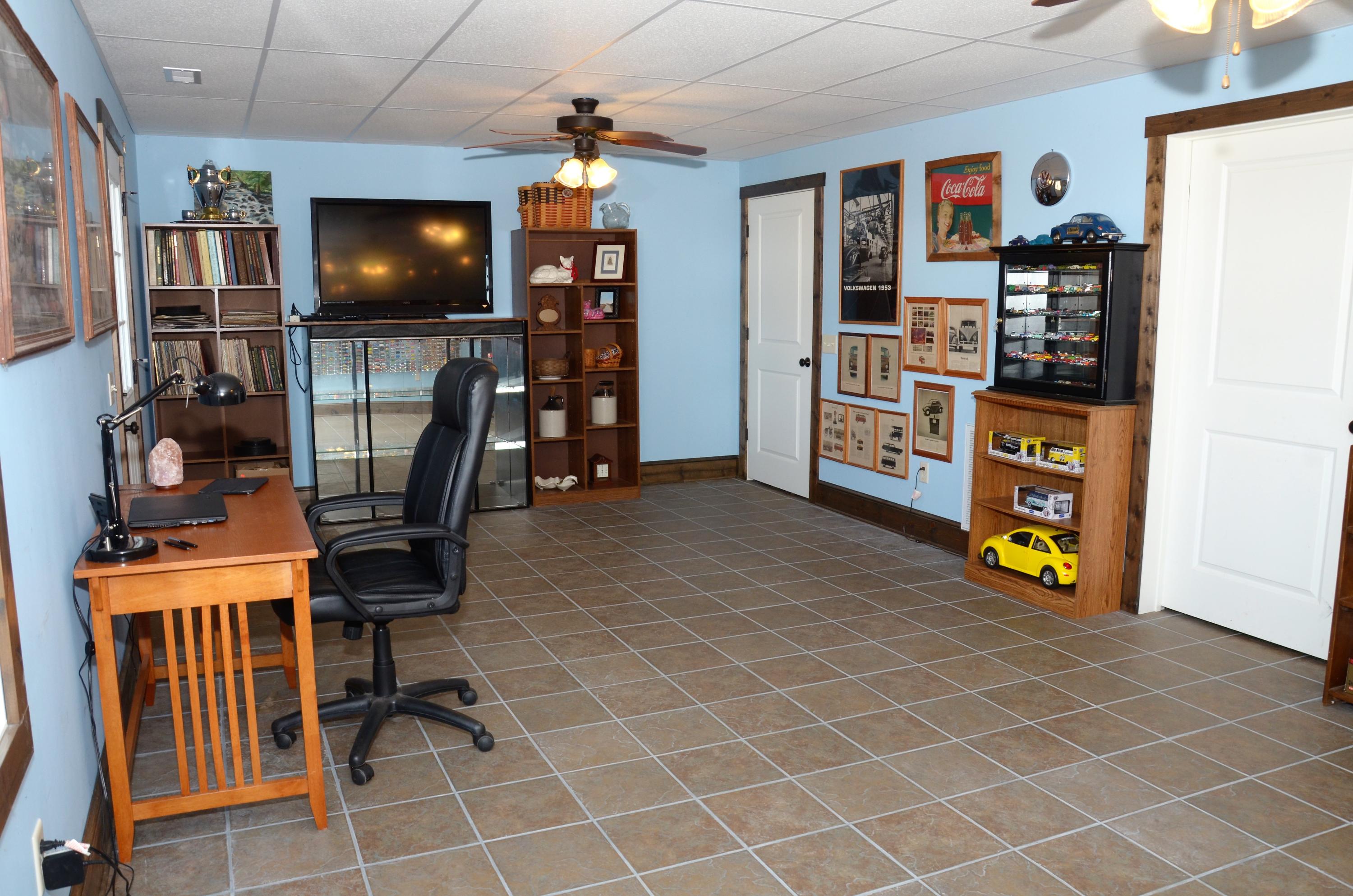 657 Poor Farm Road Southeast Floyd, VA 24091 - Photo 37 of 40 a view of a livingroom with furniture and workspace