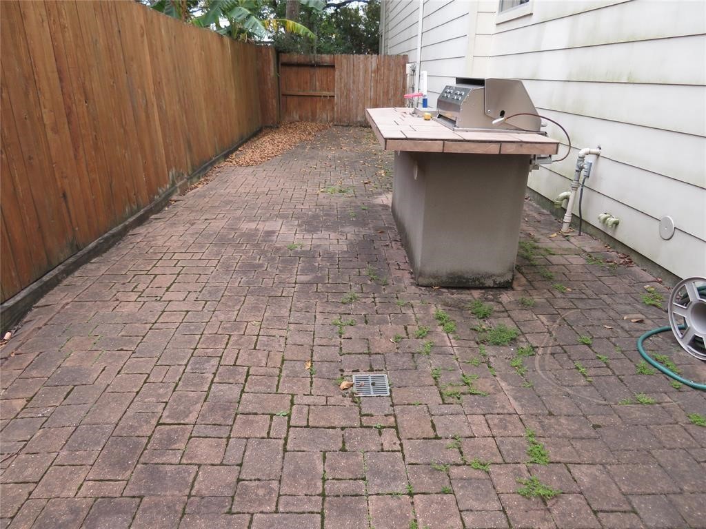 5908 Center Street Houston, TX 77007 - Photo 17 of 17 a view of a sink with white walls