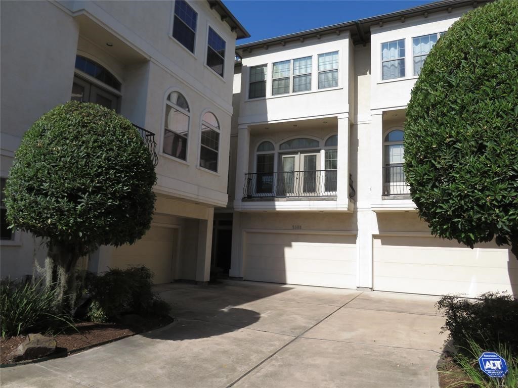 5908 Center Street Houston, TX 77007 - Photo 2 of 17 a front view of a house with a yard