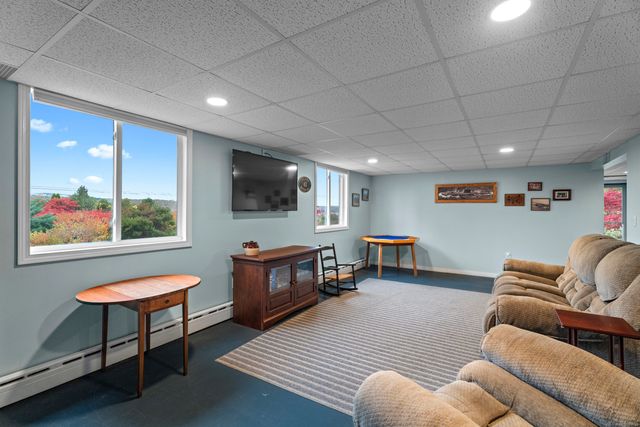a view of a hallway with washer and dryer