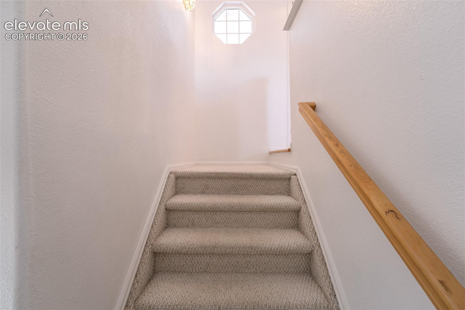 7869 Fort Smith Road Peyton, CO 80831 - Photo 29 of 50 Stairs to the Finished Basement.