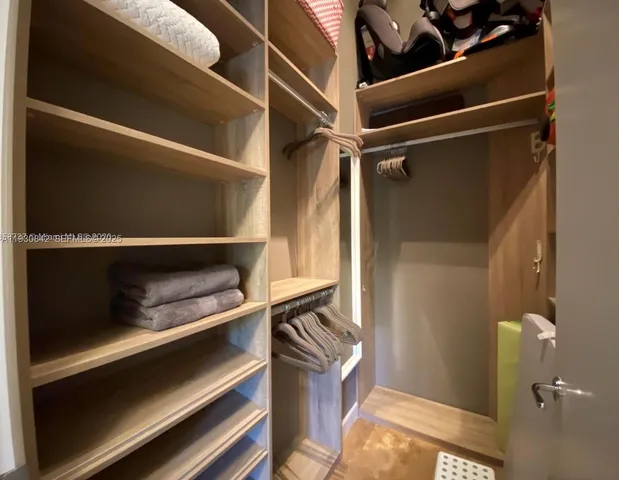 a view of a swimming pool with a deck