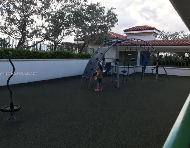a view of an house with backyard space and garden