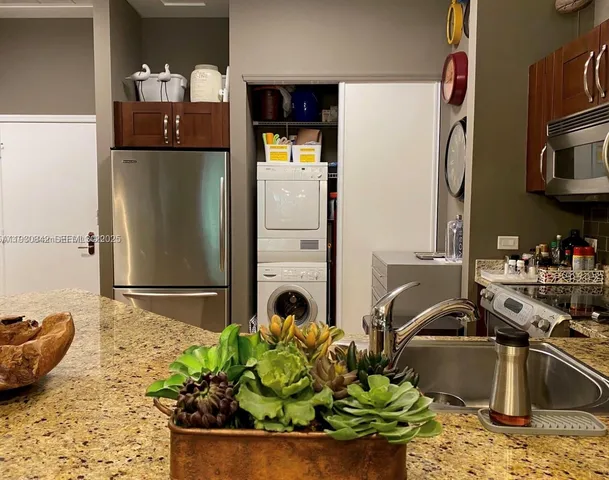 a room with painting and wooden floor