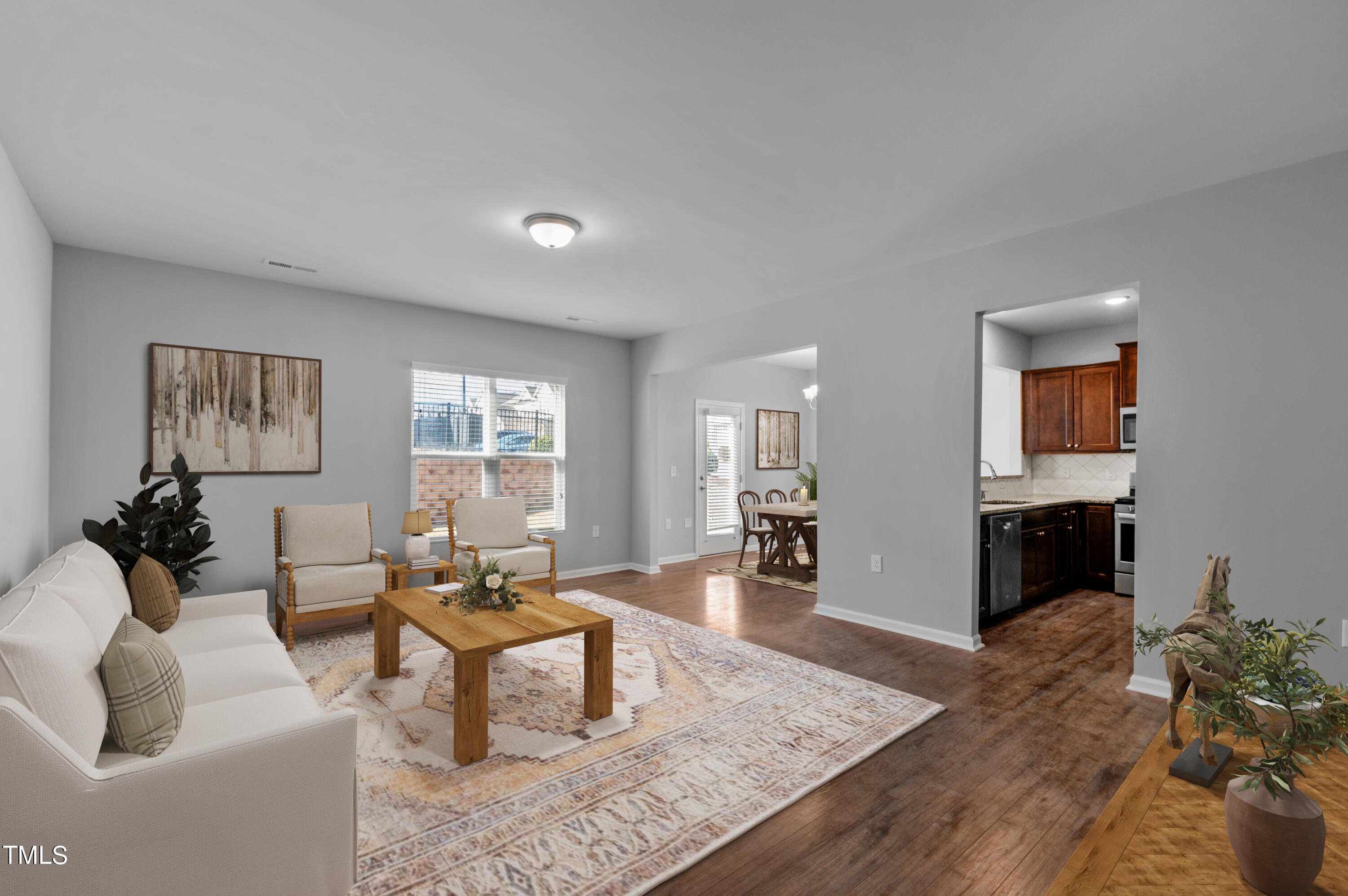 1033 Mirbeck Lane Durham, NC 27713 - Photo 13 of 37 a living room with furniture and a wooden floor