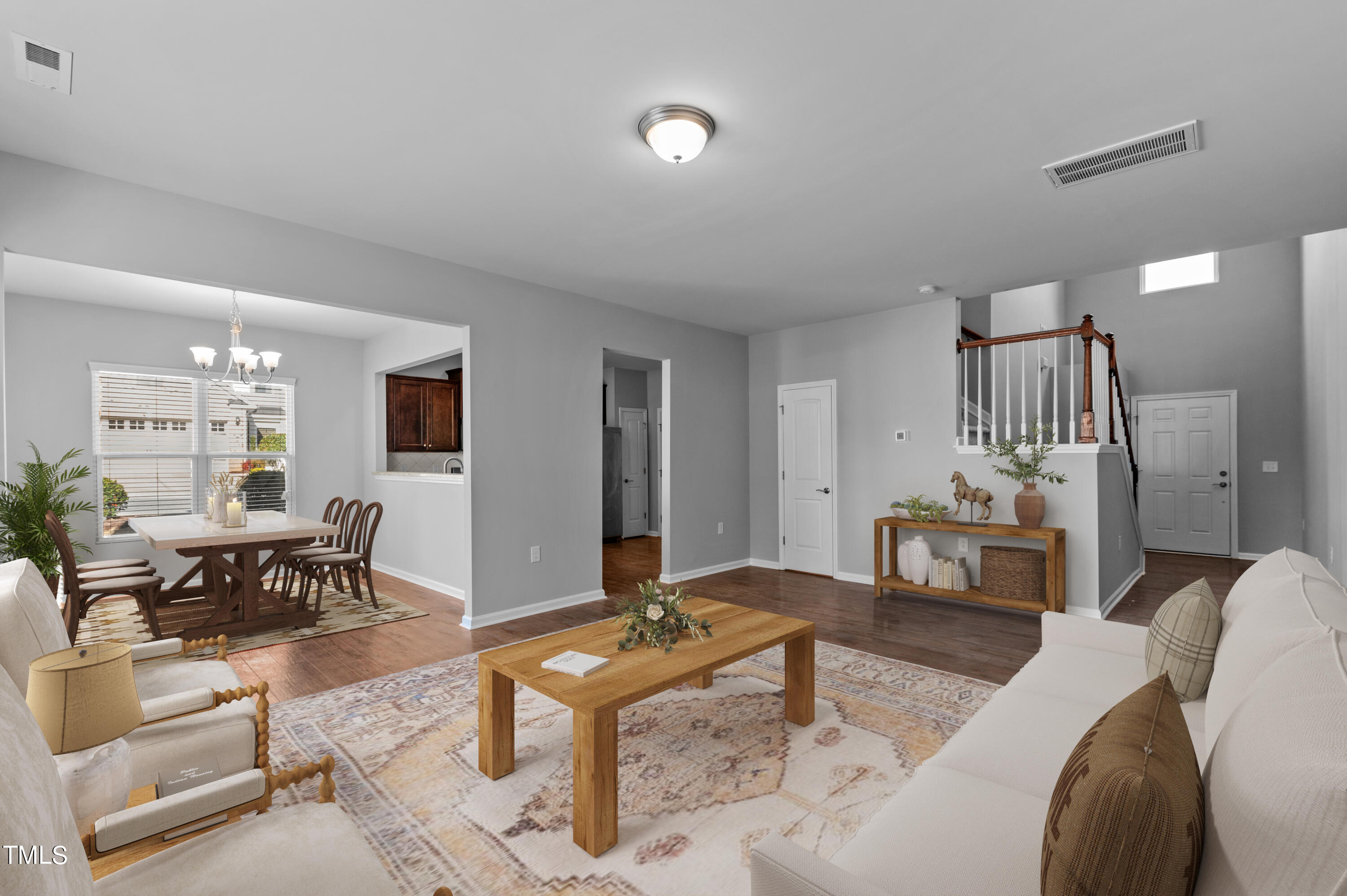 1033 Mirbeck Lane Durham, NC 27713 - Photo 14 of 37 a living room with furniture and wooden floor