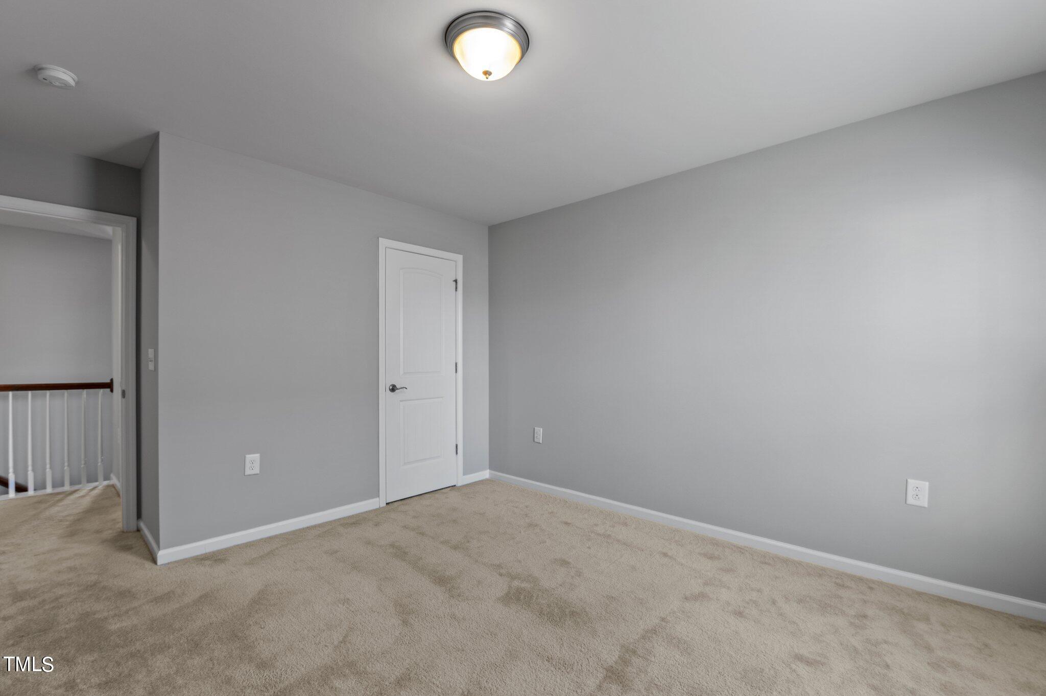 1033 Mirbeck Lane Durham, NC 27713 - Photo 24 of 37 an empty room with closet area