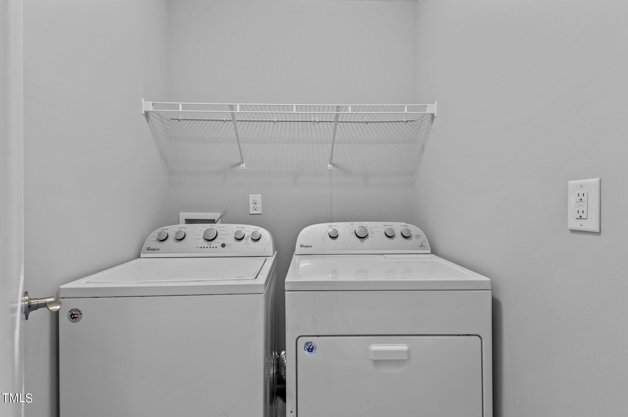 1033 Mirbeck Lane Durham, NC 27713 - Photo 25 of 37 a view of storage and utility room with washer and dryer