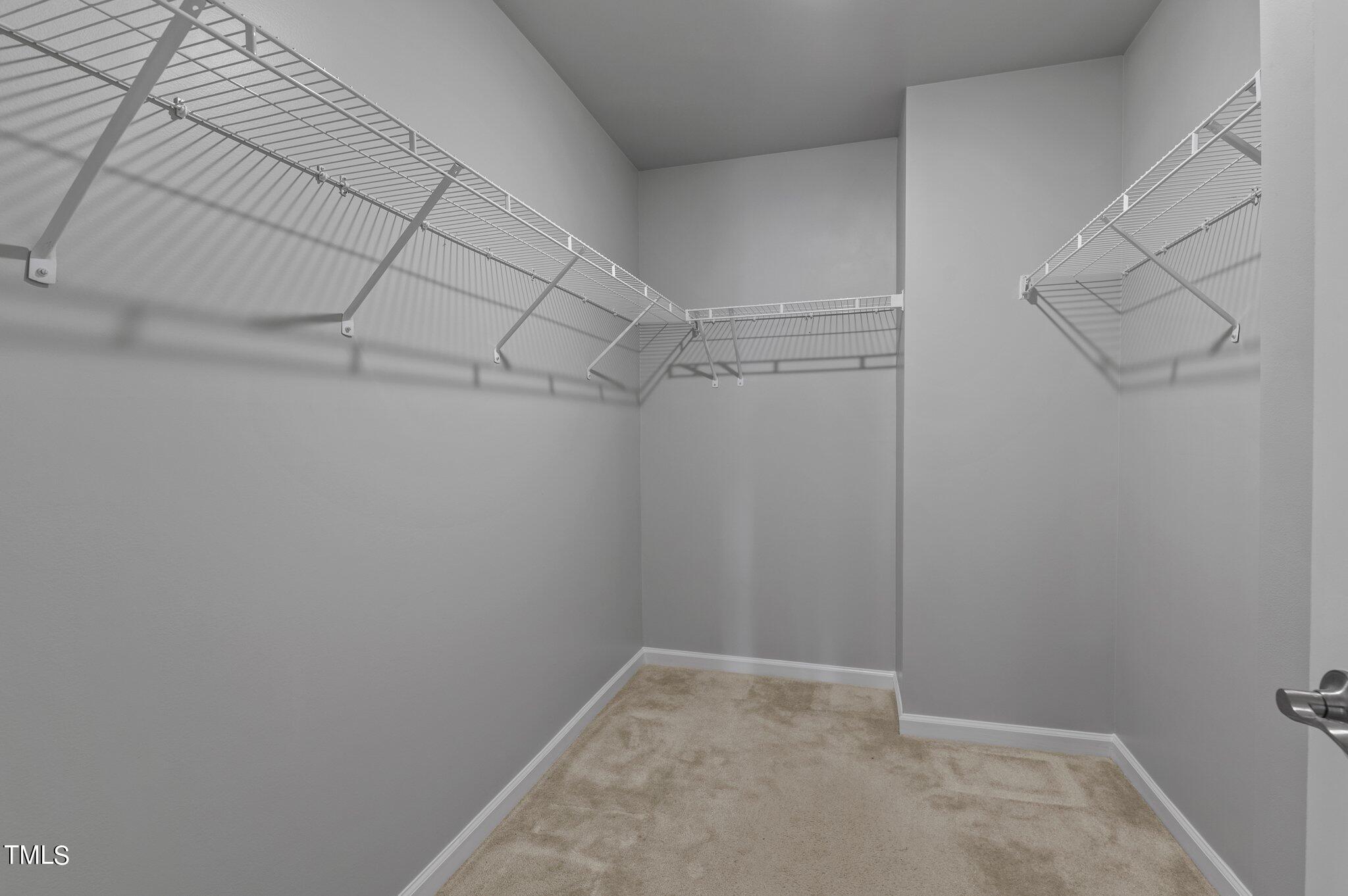 1033 Mirbeck Lane Durham, NC 27713 - Photo 31 of 37 a view of a room with racks on the wall