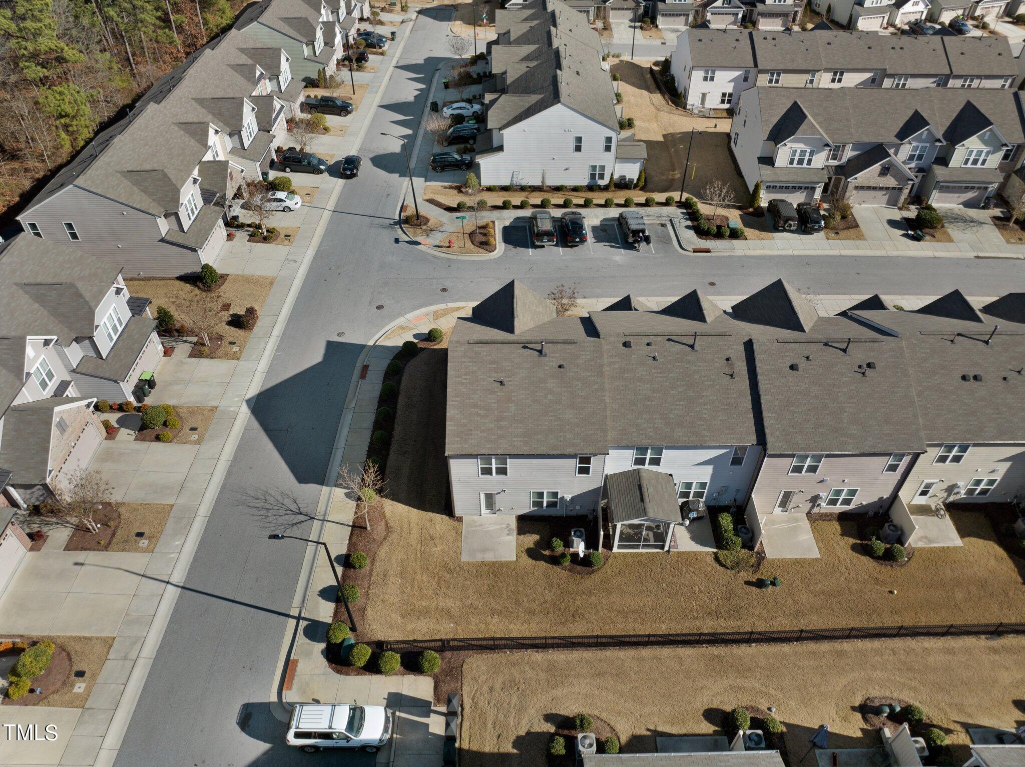 1033 Mirbeck Lane Durham, NC 27713 - Photo 37 of 37 an aerial view of residential houses with outdoor space