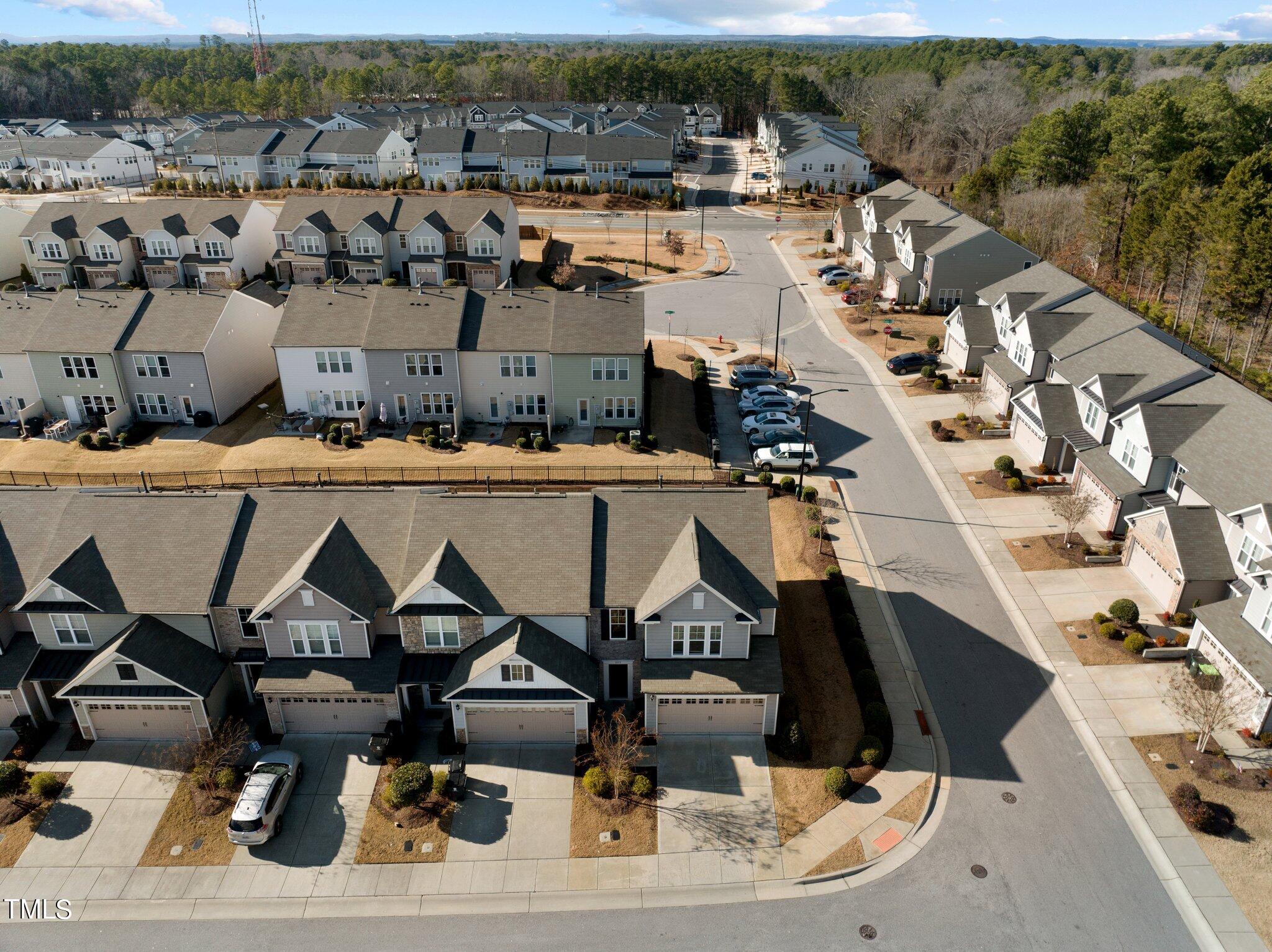 1033 Mirbeck Lane Durham, NC 27713 - Photo 6 of 37 an aerial view of residential houses with outdoor space