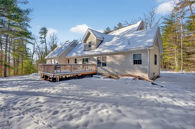 a view of house with a outdoor space and shower