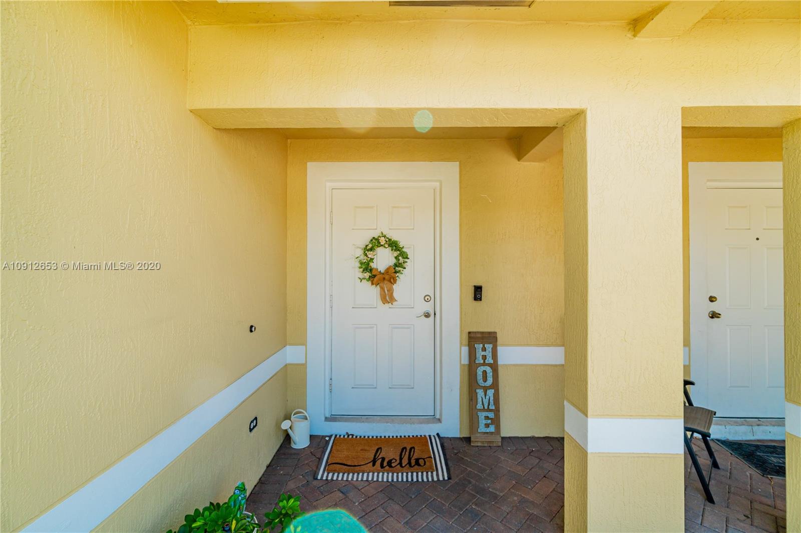 5904 Abbey Road, Unit 5904 Tamarac, FL 33321 - Photo 8 of 40 a view of room with wooden floor