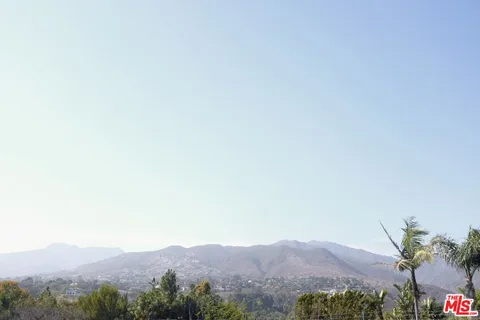 a view of a large mountain in the distance