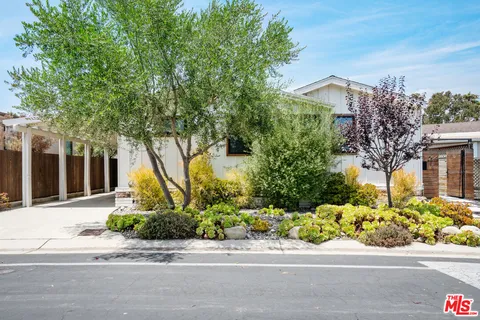 front view of a house with a street