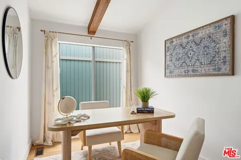 a view of a workspace with furniture