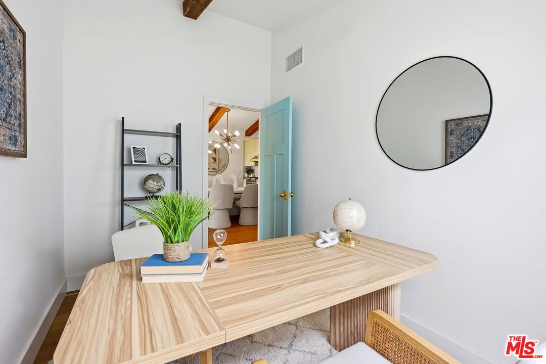 29500 Heathercliff Road, Unit 294 Malibu, CA 90265 - Photo 27 of 35 a bedroom with a bed and a potted plant