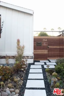 a view of a pathway with a bench