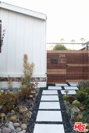 a view of a pathway with a bench