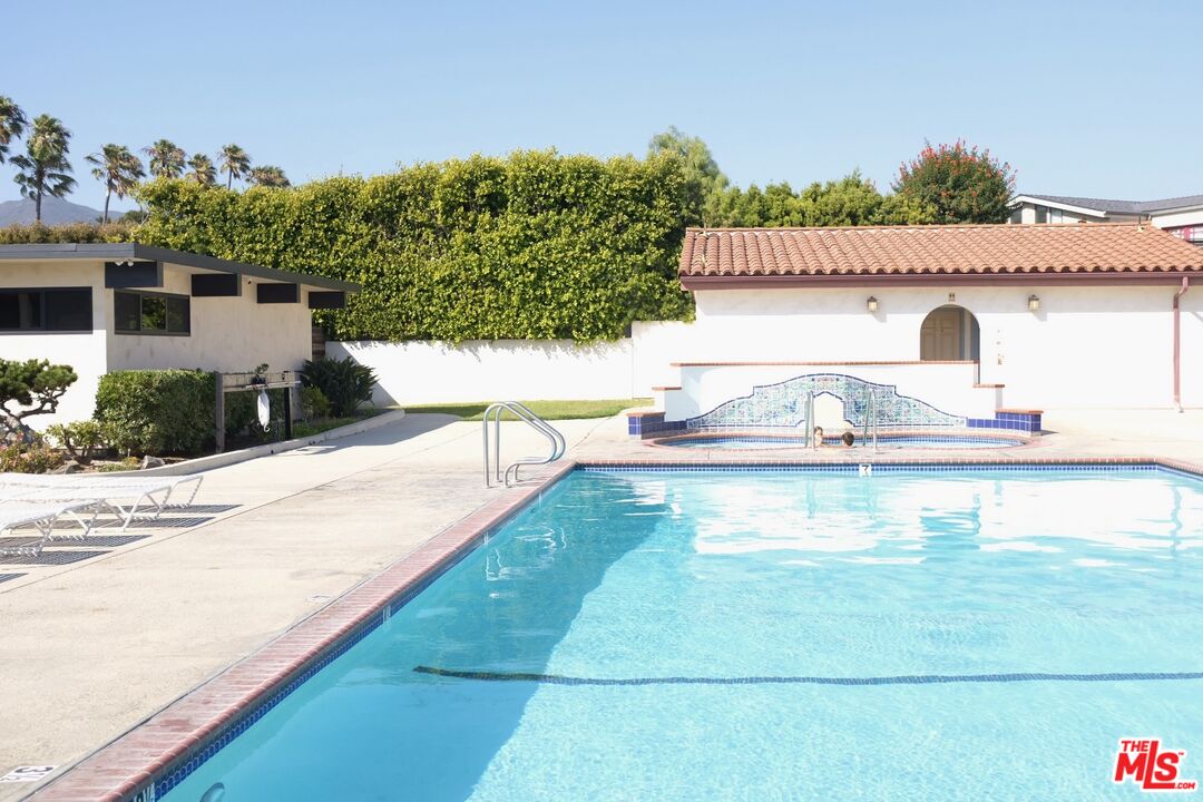 29500 Heathercliff Road, Unit 294 Malibu, CA 90265 - Photo 33 of 35 a view of a swimming pool with a patio