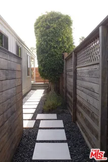 a view of a pathway with a house