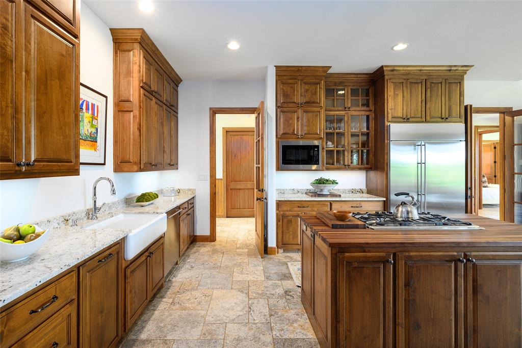 11503 East Rocky Creek Road Crowley, TX 76036 - Photo 11 of 40 a spacious bathroom with a granite countertop double sink and a mirror