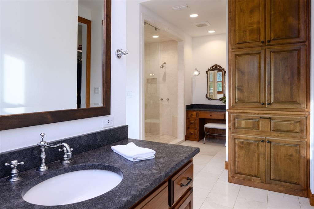 11503 East Rocky Creek Road Crowley, TX 76036 - Photo 18 of 40 a bathroom with a granite countertop sink and a mirror