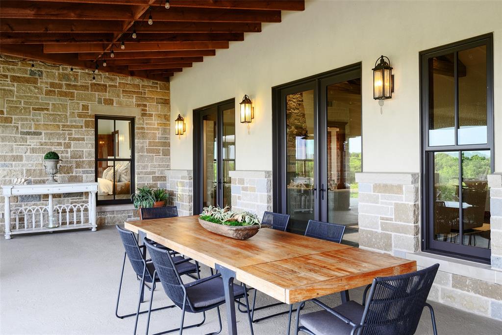 11503 East Rocky Creek Road Crowley, TX 76036 - Photo 29 of 40 a view of a dining room with furniture window and wooden floor