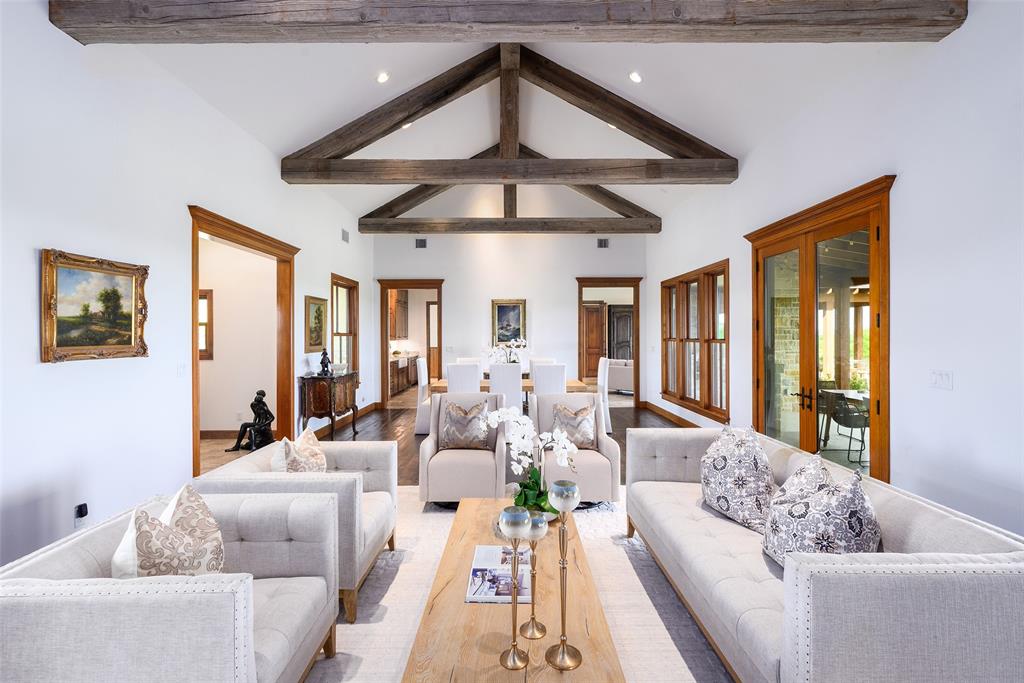 11503 East Rocky Creek Road Crowley, TX 76036 - Photo 6 of 40 a living room with furniture and a chandelier