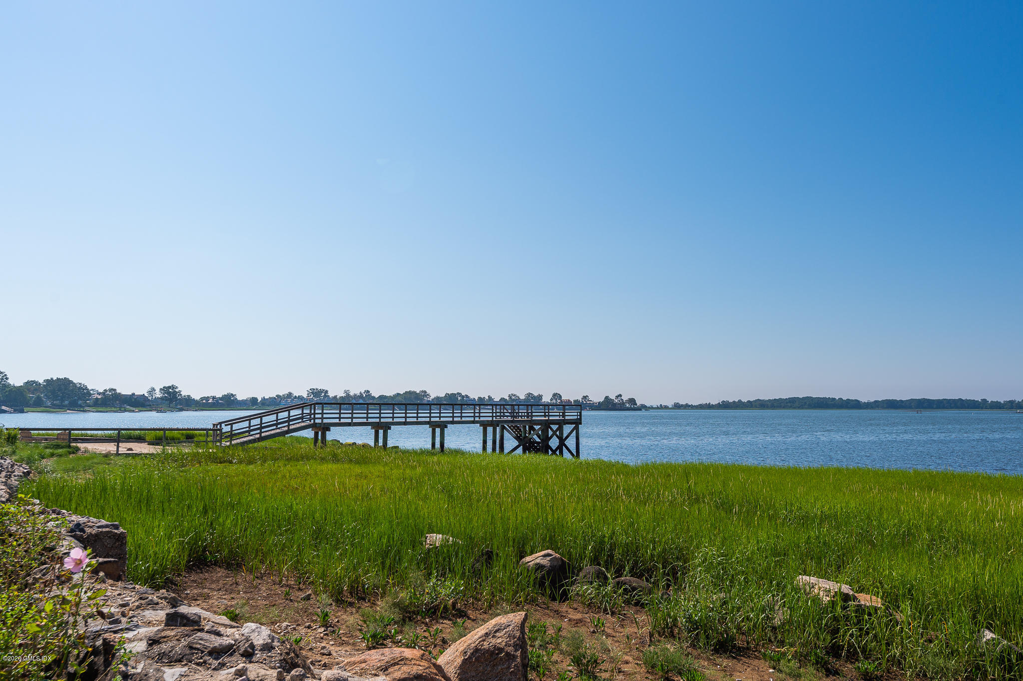 20 Meadow Road Riverside, CT 06878 - Photo 19 of 23 a view of a lake with a big yard
