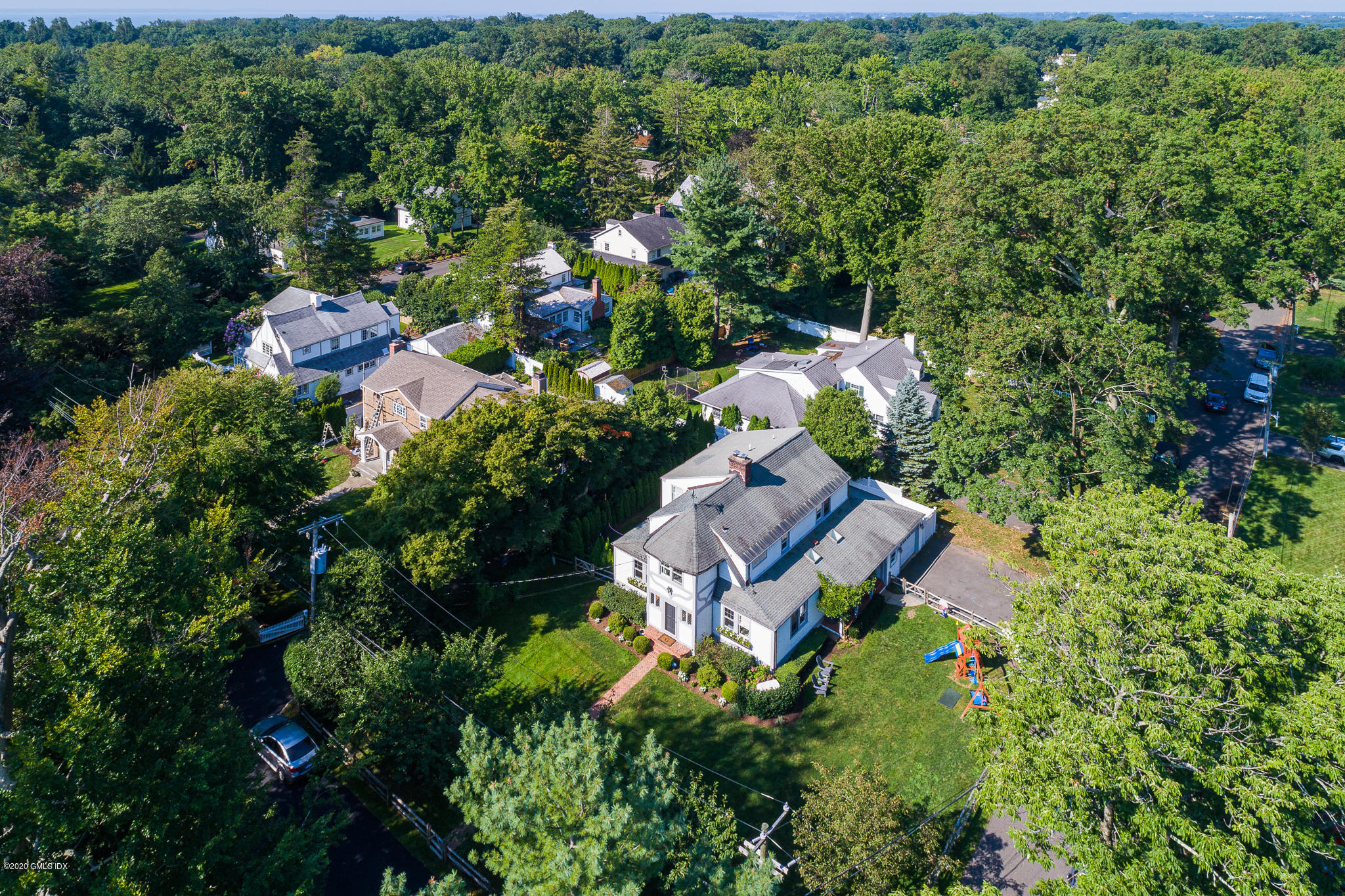 20 Meadow Road Riverside, CT 06878 - Photo 20 of 23 an aerial view of a house with yard swimming pool and outdoor seating