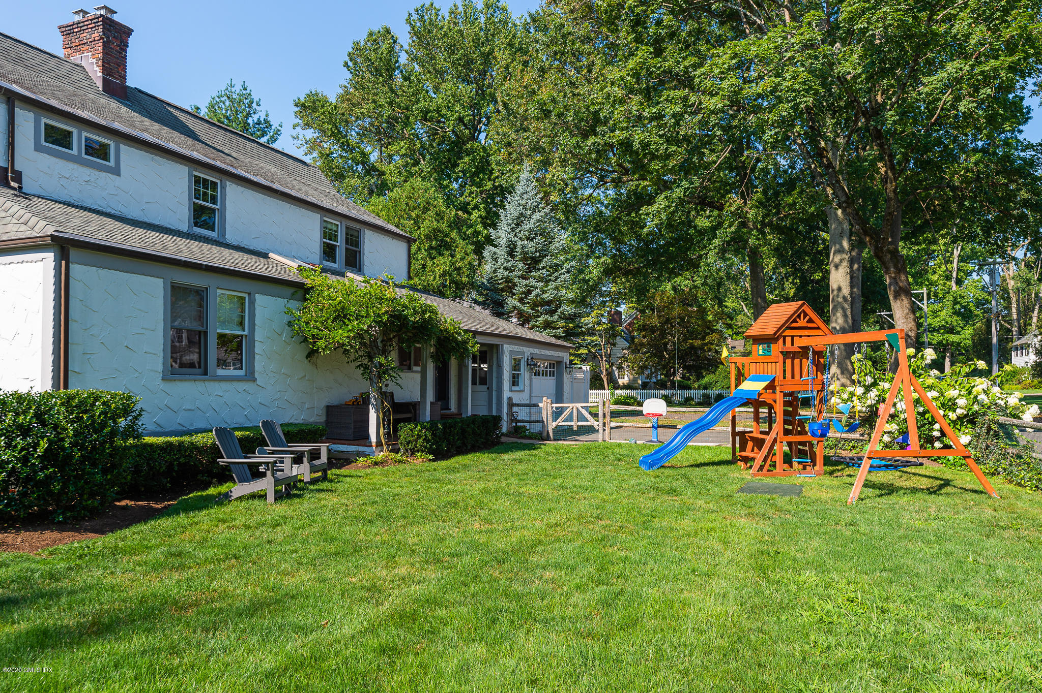 20 Meadow Road Riverside, CT 06878 - Photo 3 of 23 a view of a house with patio and a yard
